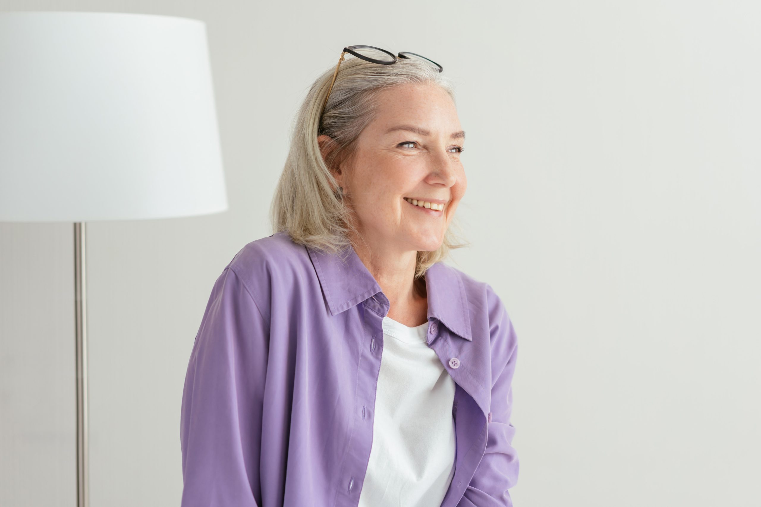 Photo of an elderly lady smiling.